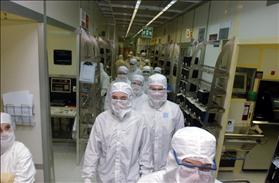 Young scientists in the clean room of the Intel plant in Jerusalem  Photo Flash 90