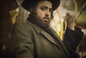 Haredi man on bus, source: Wikipedia