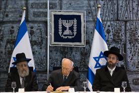 Swearing-in ceremony for the newly elected Chief Rabbis in the presidential residence in Jerusalem. From the left Chief Sephardic Rabbi Yitzhak Yosef , President Shimon Peres 